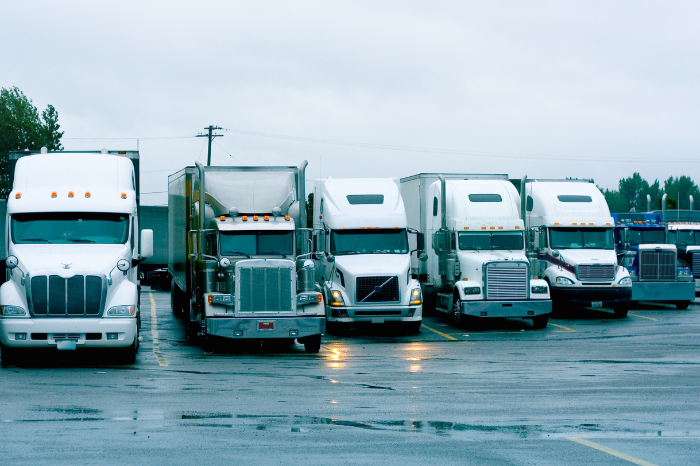 semi trucks in rain