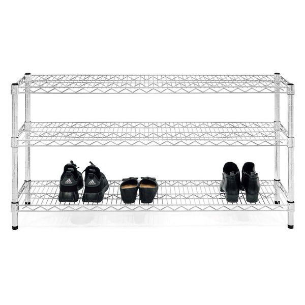 Chrome wire shelving unit with three shelves. Bottom shelf of the unit is holding three pairs of black shoes.